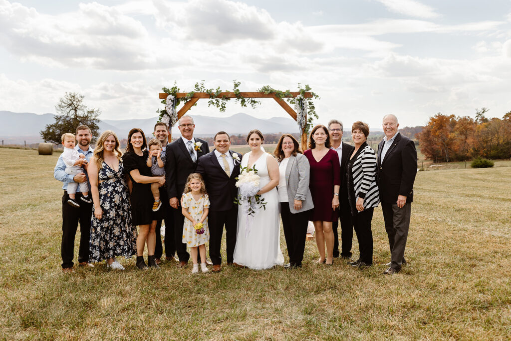 the wedding couple taking family wedding photos 