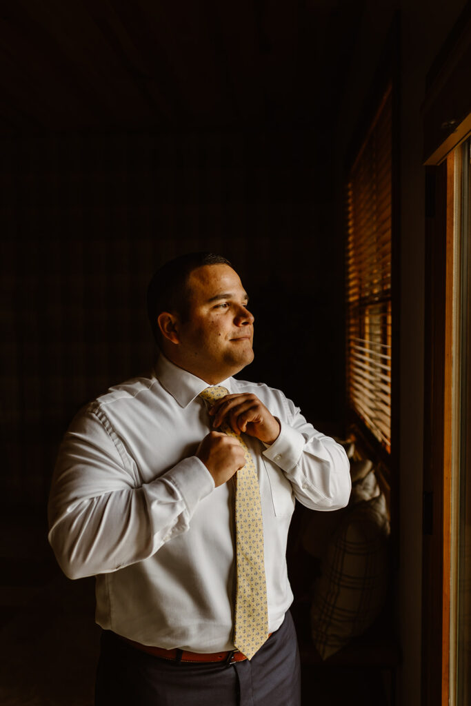 the groom getting ready for his Shenandoah elopement