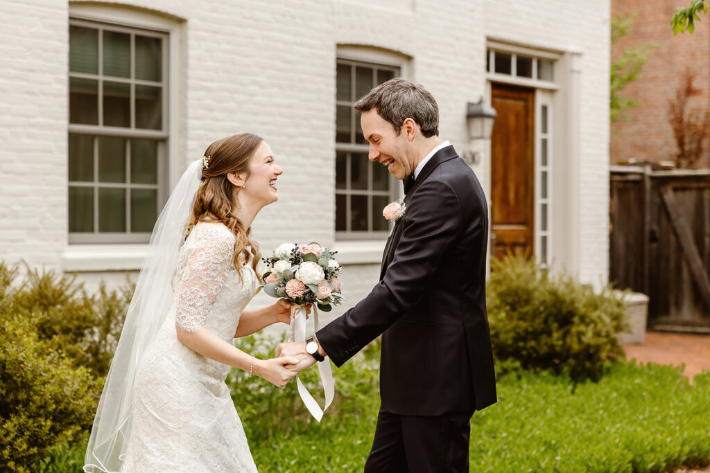 the wedding couple excited at their first look