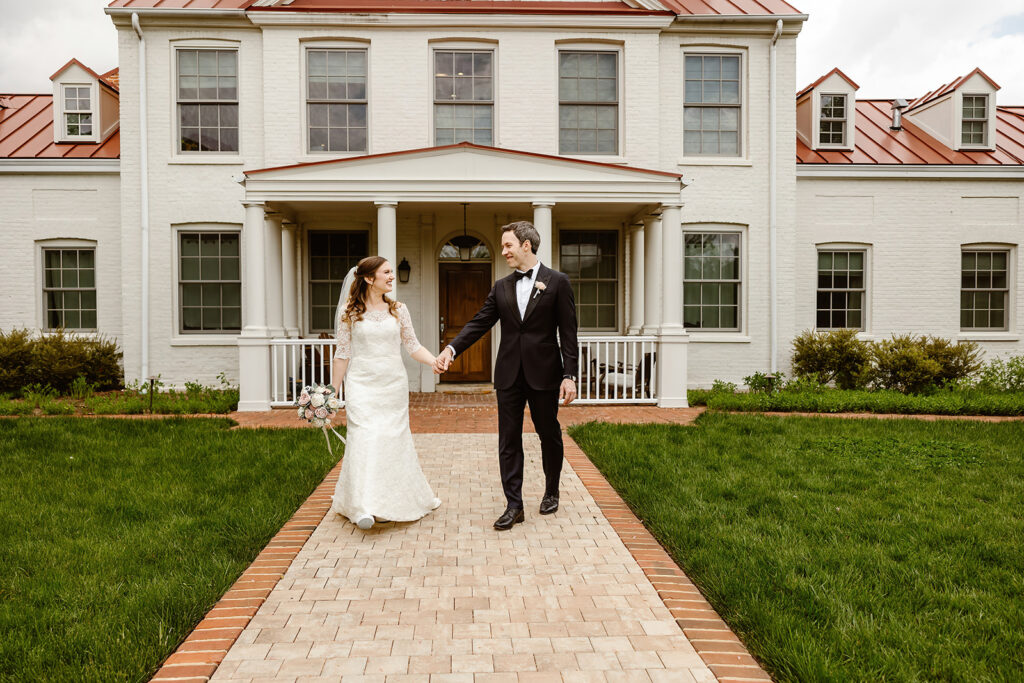 the wedding couple walking together in their neighborhood in Washington DC