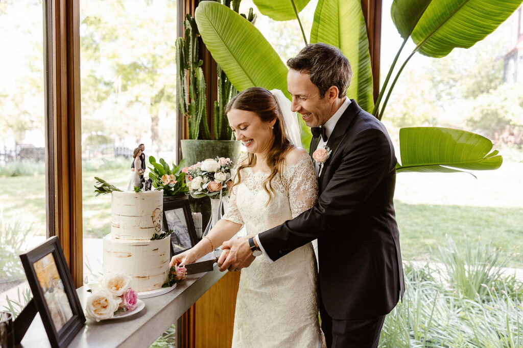 the bride and groom cutting the cake at their DC elopement reception