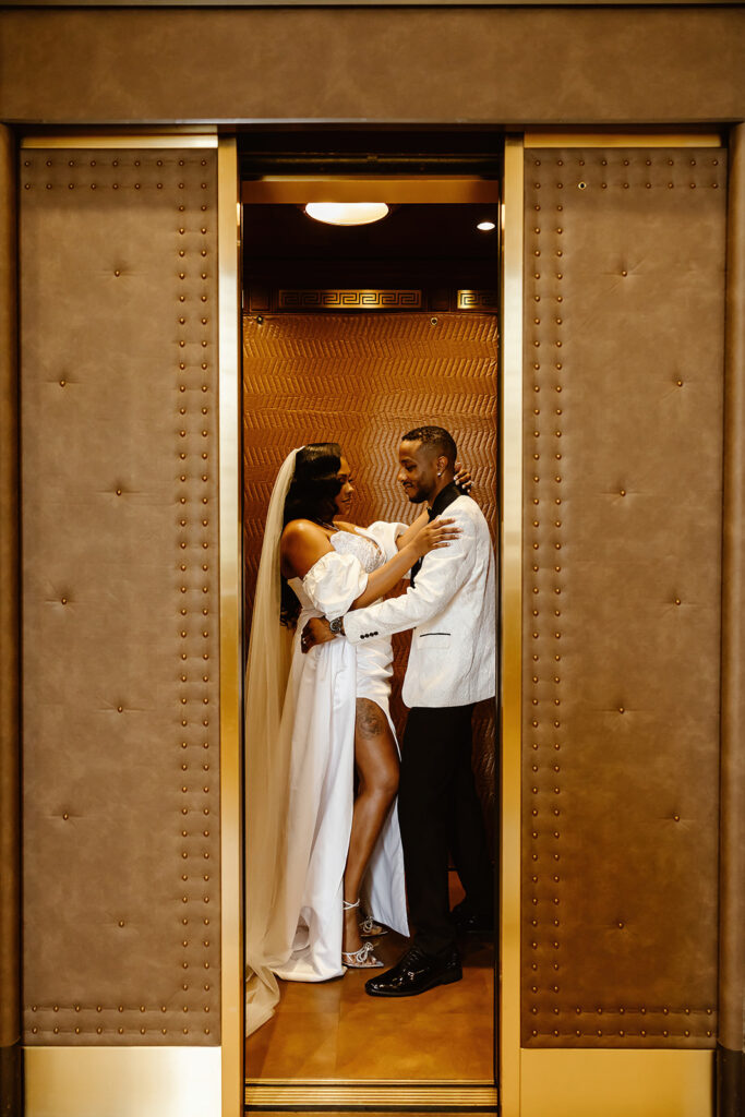 the wedding couple in the elevator during their DC elopement