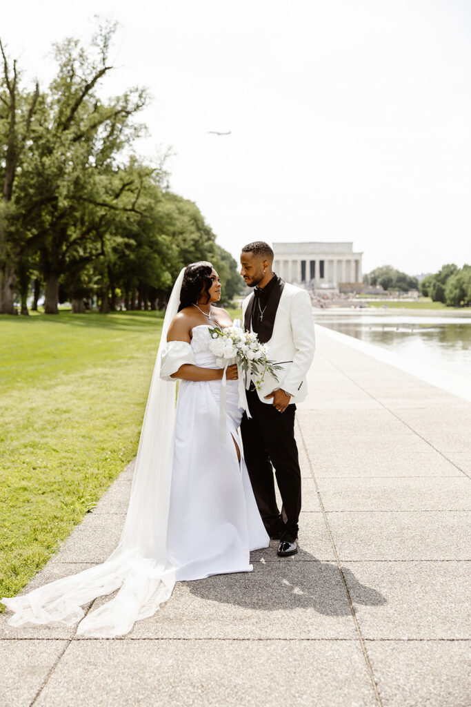 the elopement couple by the Lincoln Memorial for elopement photos