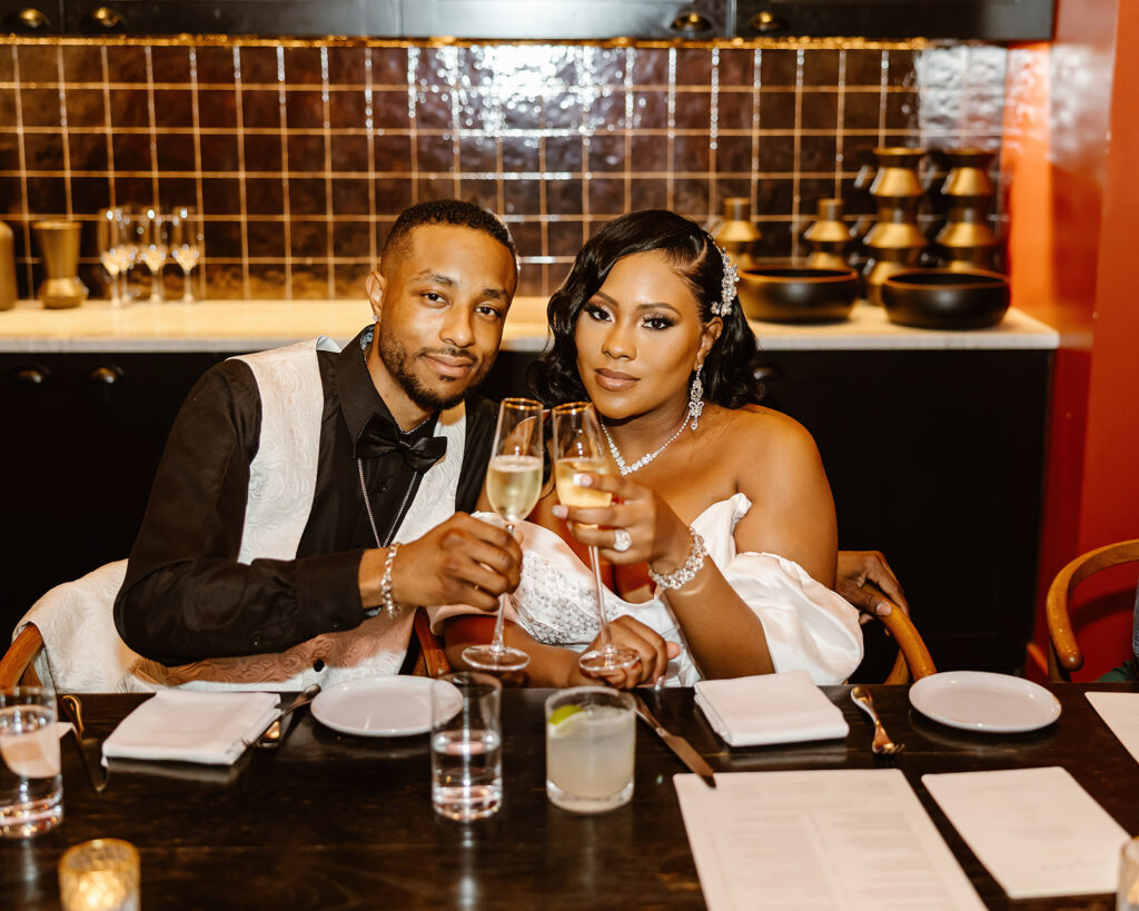 the wedding couple at the restaurant for their reception