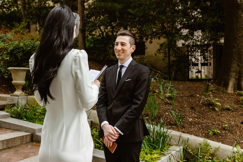 the wedding couple saying their vows during their DC elopement ceremony at the Spanish Steps