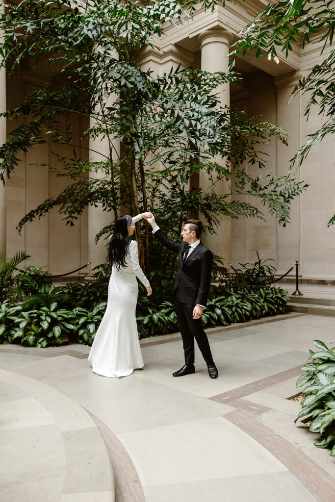 the wedding couple dancing at the National Gallery of Art