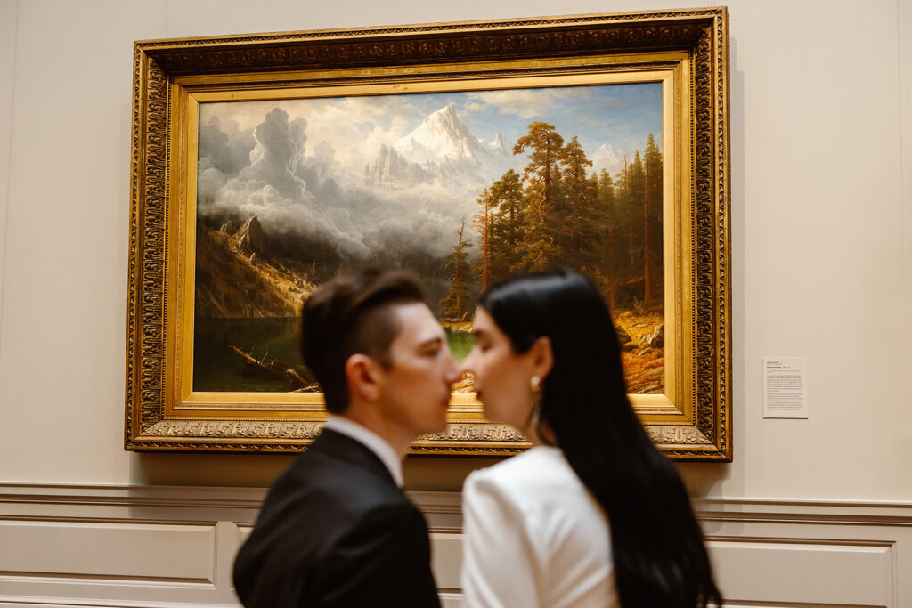 the wedding couple with a painting at the National Gallery of Art