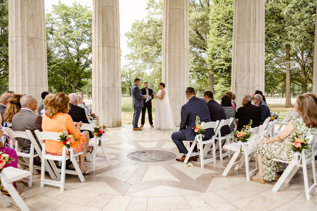 wedding ceremony at the DC War Memorial in Washington DC sharing their wedding vows