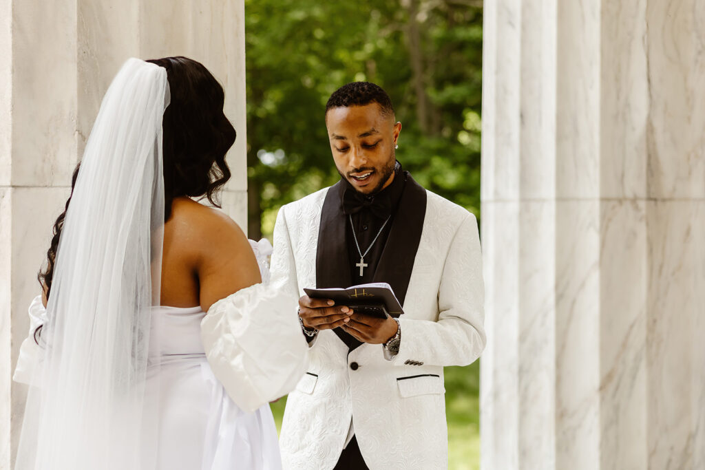 the wedding couple sharing their vows for their DC War Memorial elopement