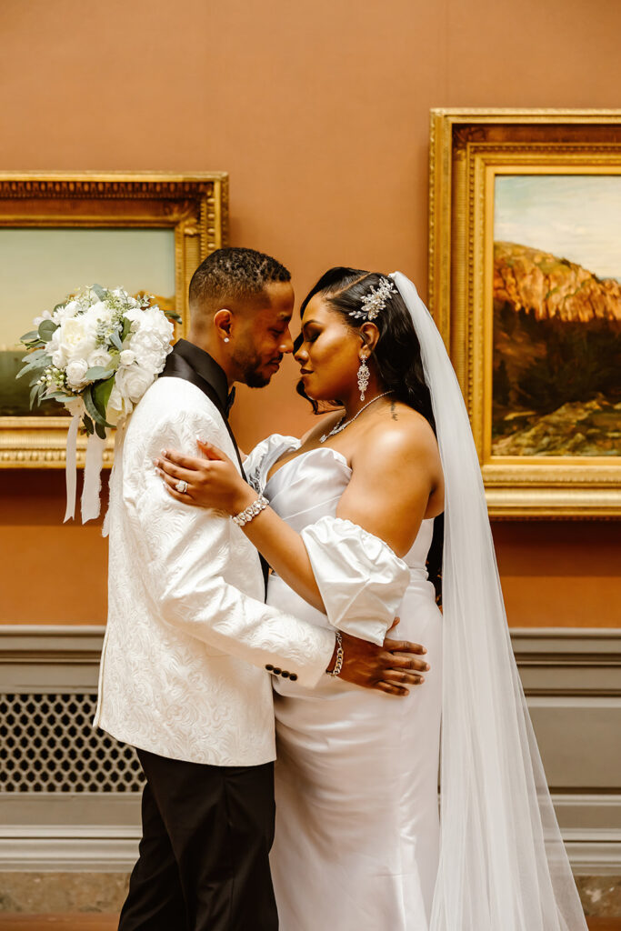 elegant bride and groom at the national gallery of art during their last minute elopement in dc
