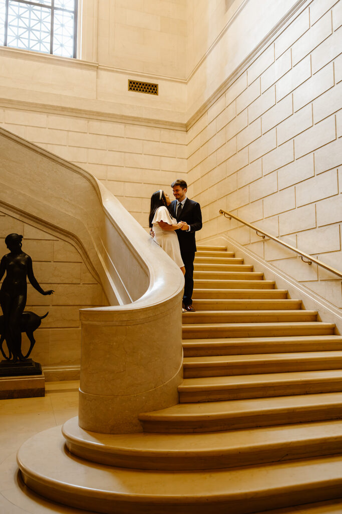 the Washington DC art museum stairs with a wedding couple