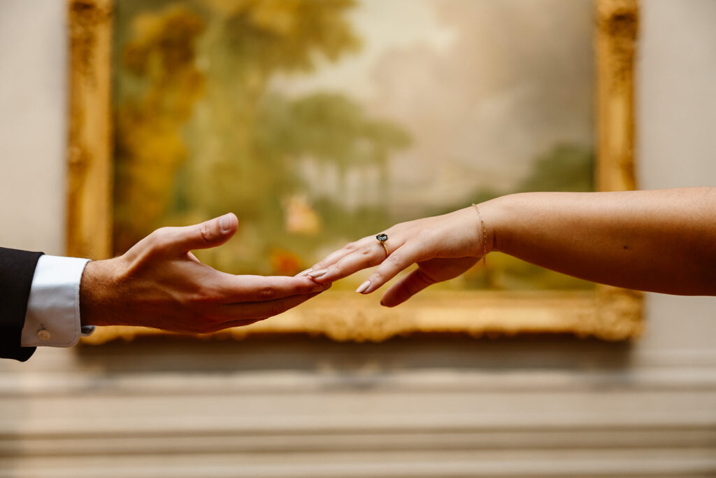 hands reaching towards each other at the National Gallery of Art