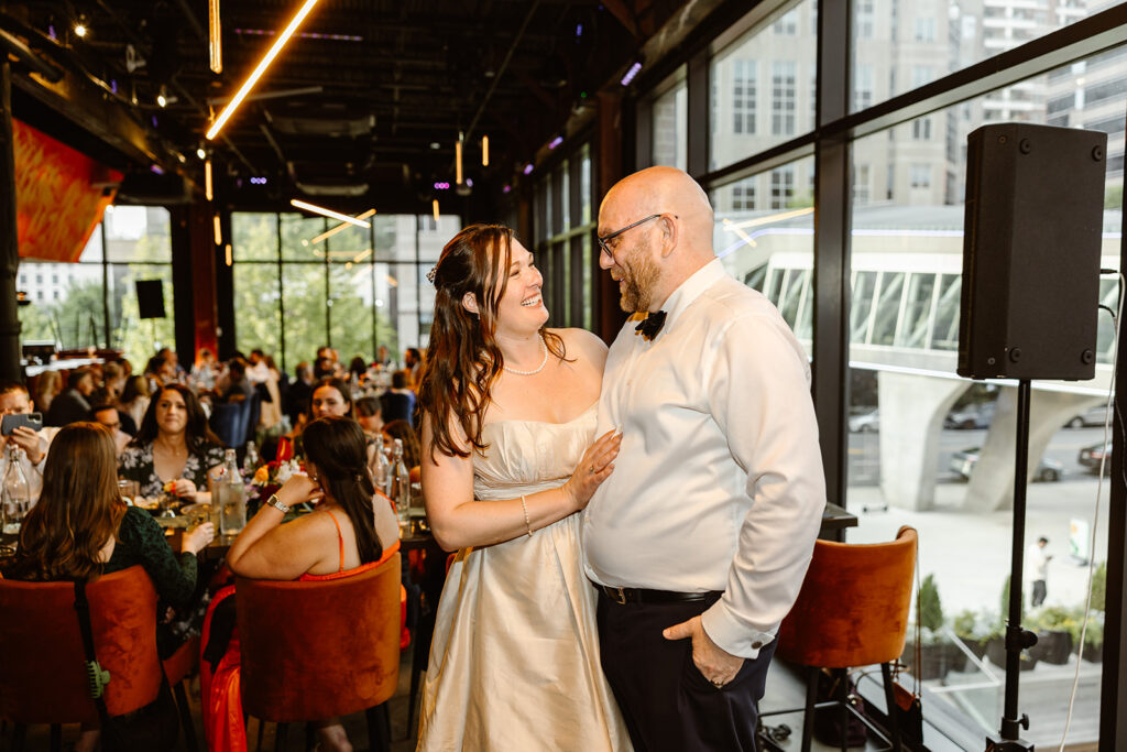 the wedding couple enjoying their wedding reception