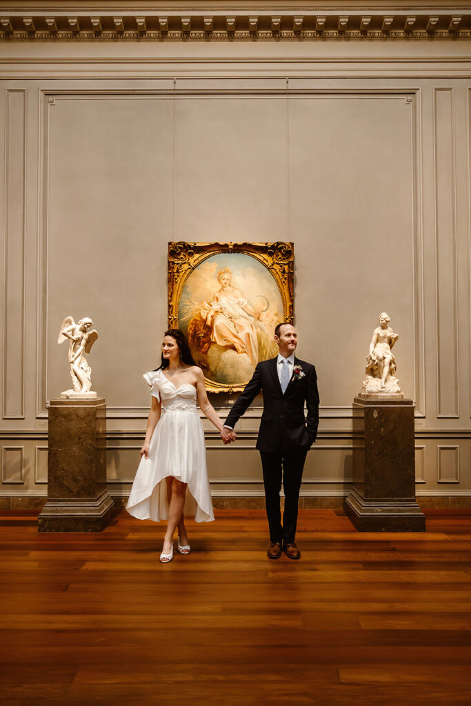 the wedding couple standing together at the National Gallery of Art