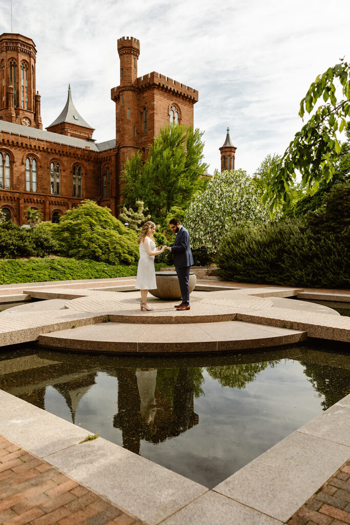 the wedding couple eloping at the Smithsonian Castle