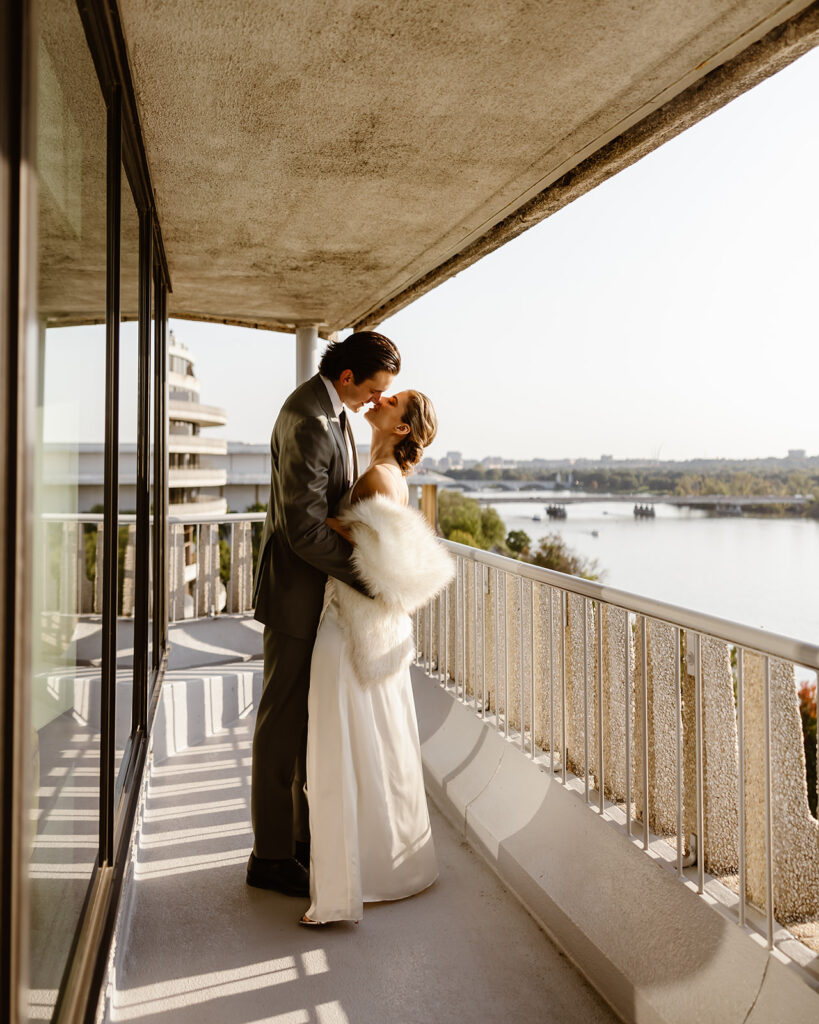 wedding couple on their balcony for DC elopement photos