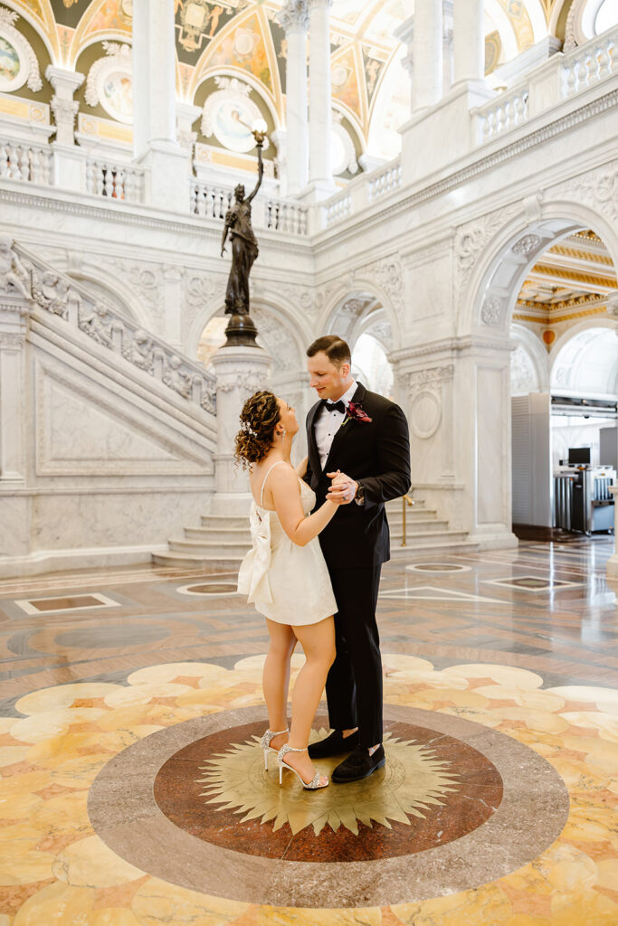 the wedding couple dancing at the Library of Congress