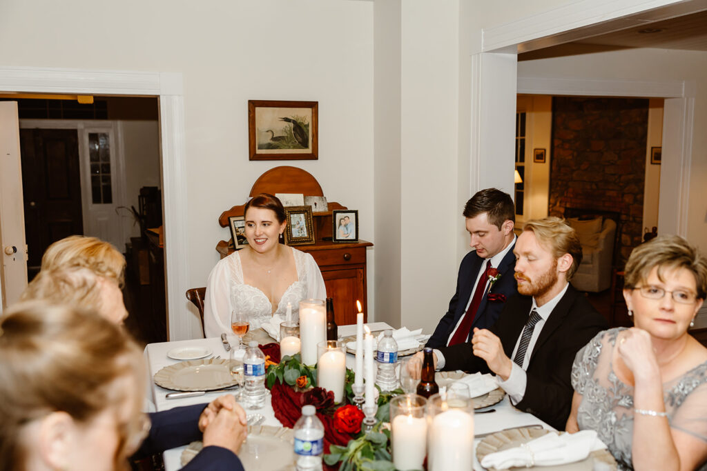 the wedding couple enjoying dinner 