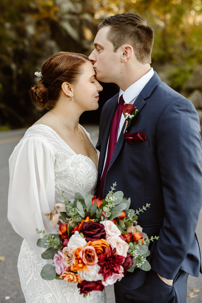 the wedding couple taking wedding photos 