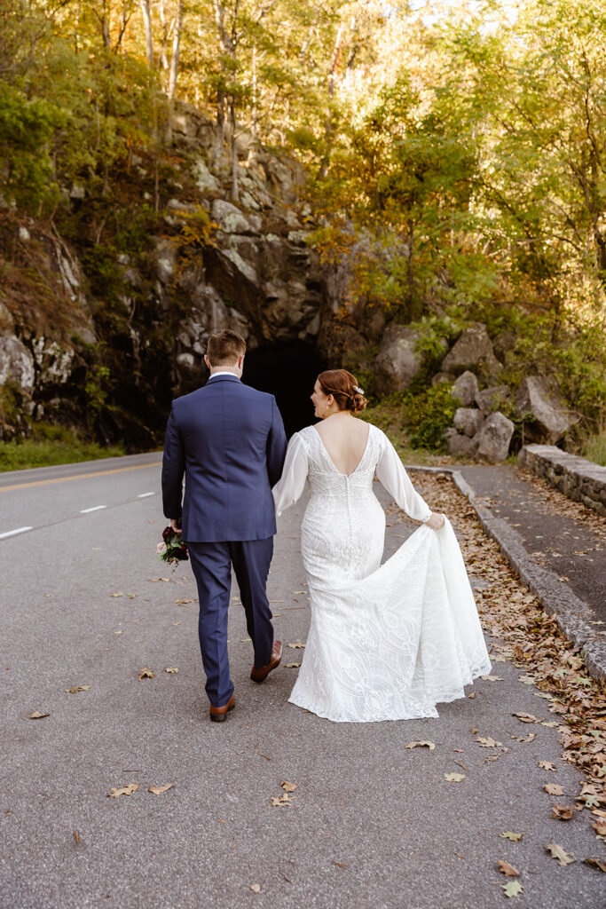 the wedding couple walking away at Shenandoah National Park