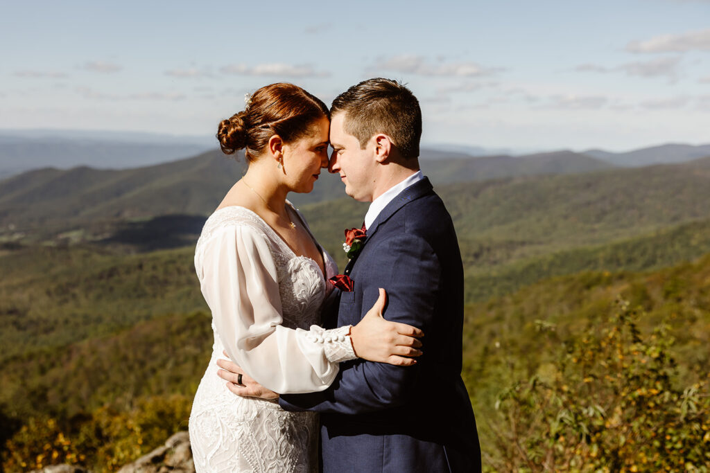 the wedding couple on the top of Shenandoah National Park during a Virginia elopement