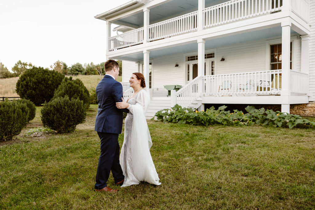 the wedding couple dancing out front of the VRBO