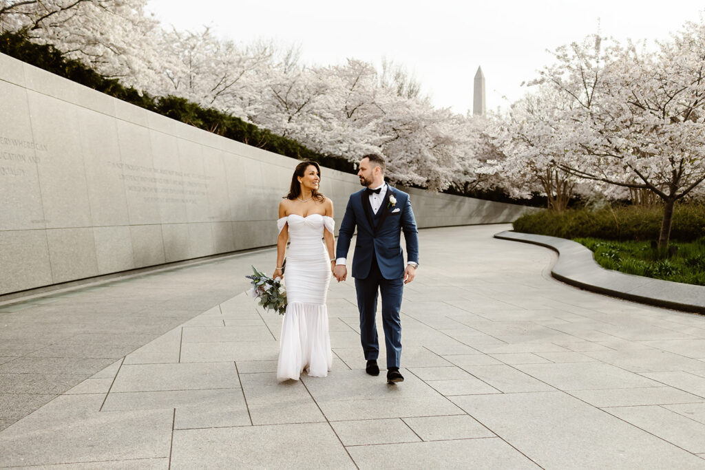 the wedding couple walking in Washington DC