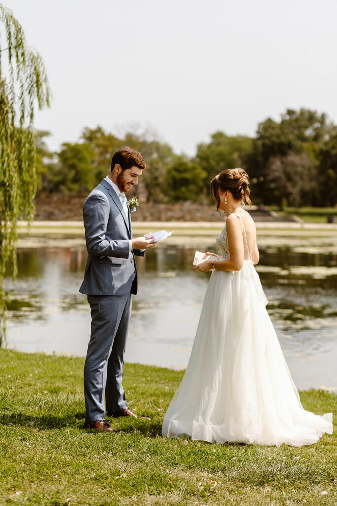 the wedding couple sharing their private vows at the Constitution Garden Pond