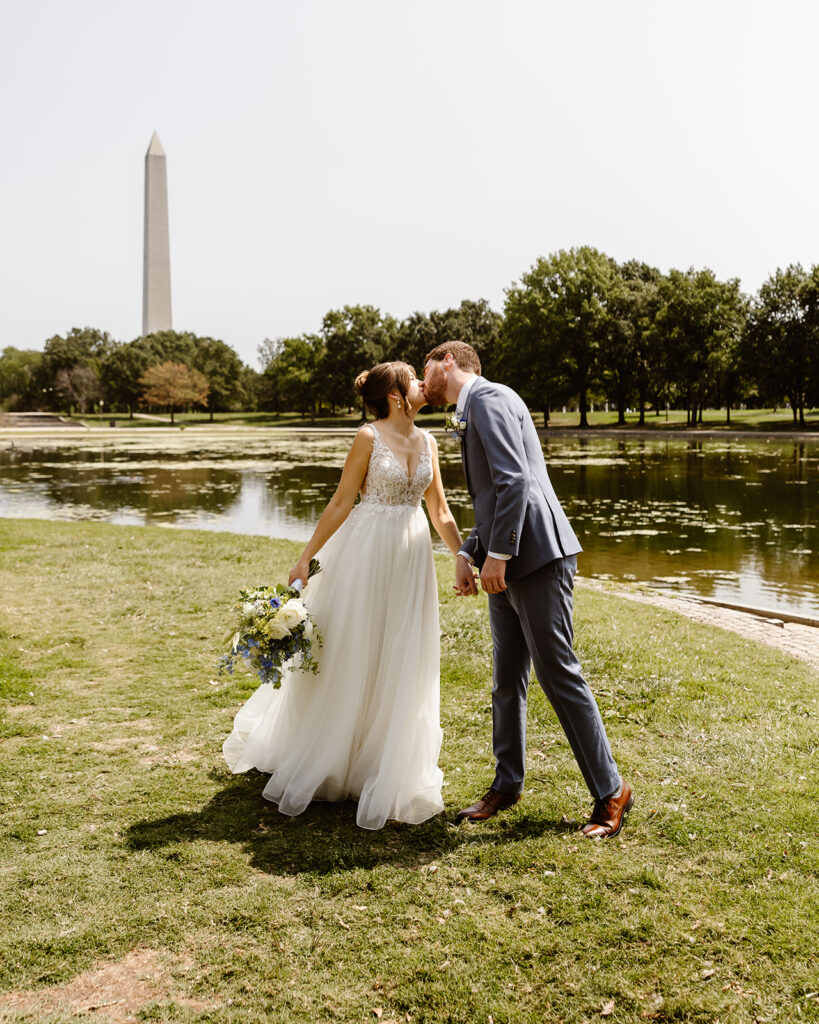 the wedding couple kissing on the National Mall