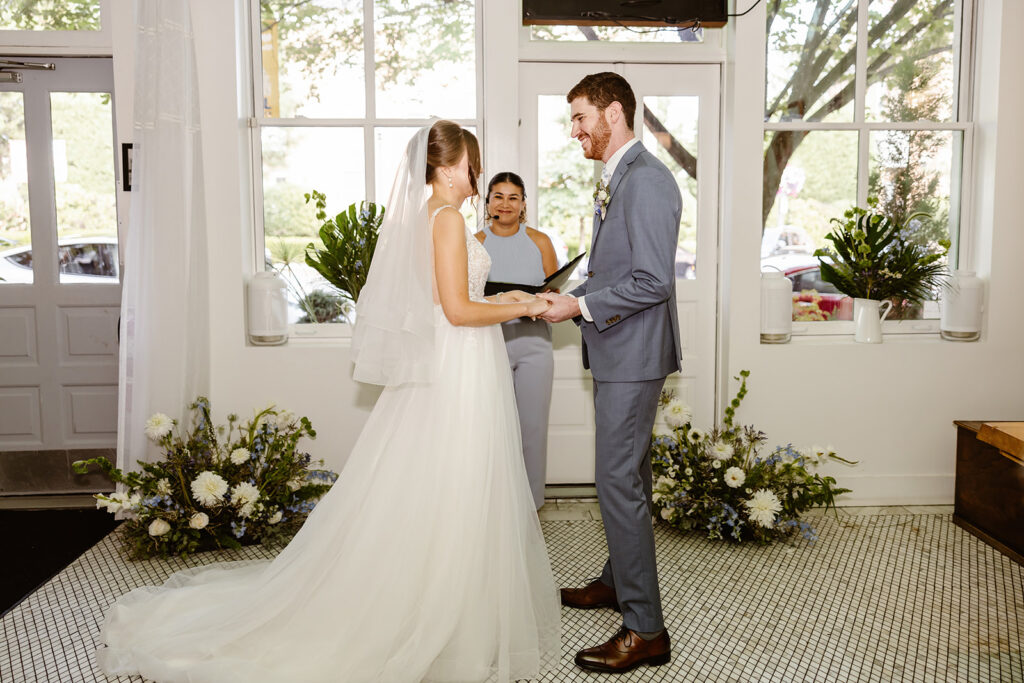 the bride and groom at the altar for their DC Wedding