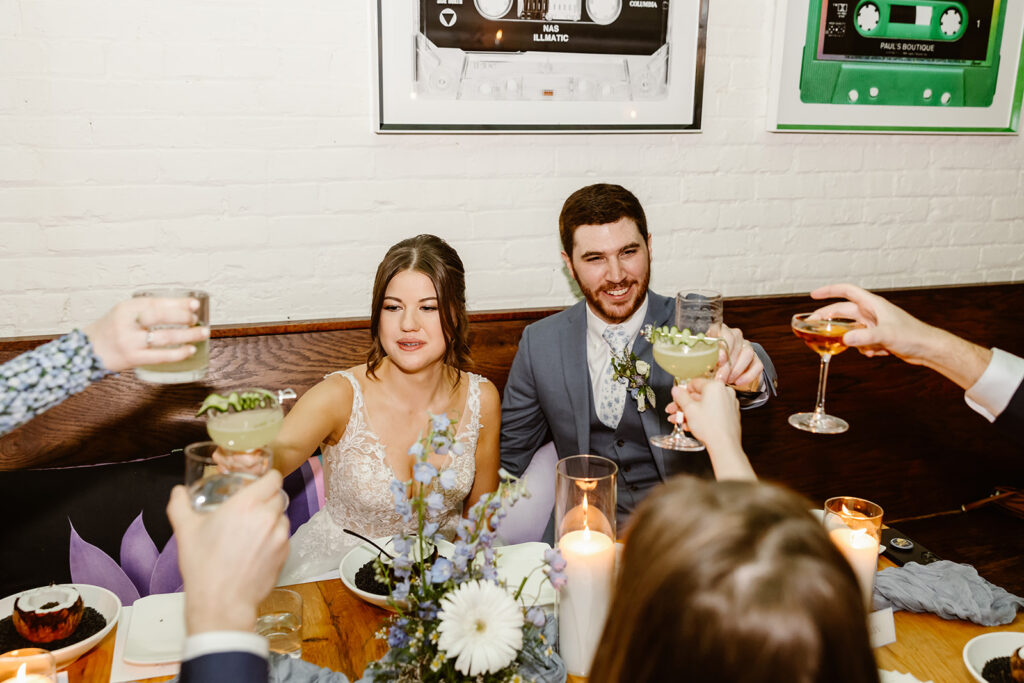 the bride and groom at their table