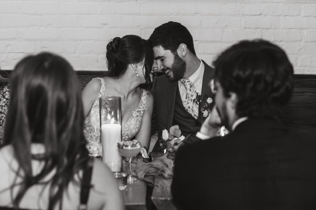 the bride and groom at their wedding reception 