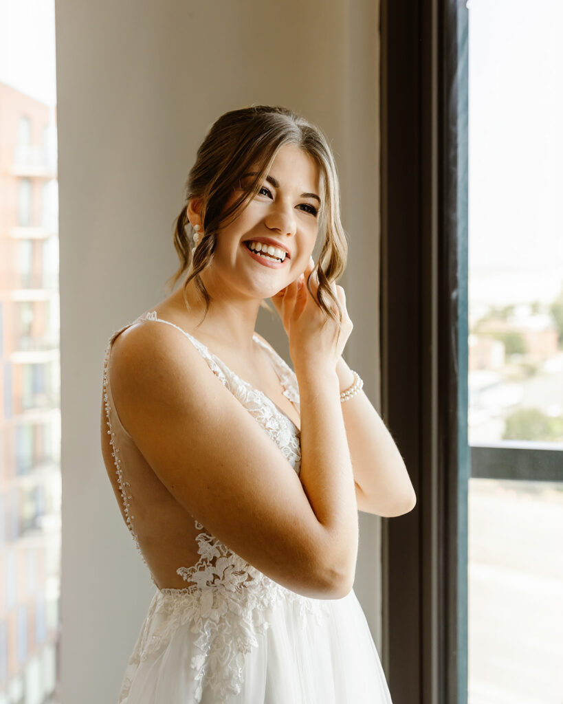 the bride getting ready for her DC wedding in the hotel room