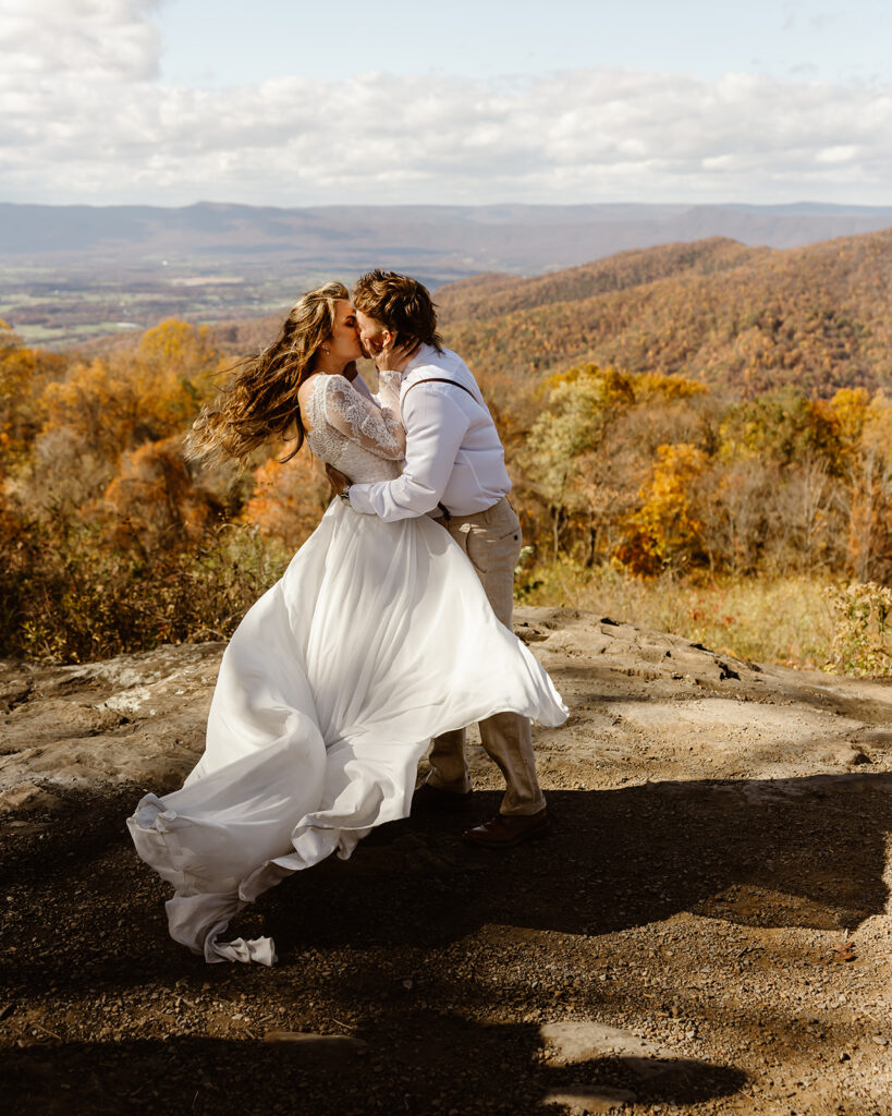 the wedding couple kissing at Shenandoah National Park