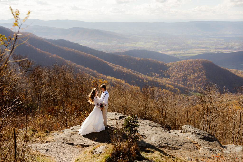 the wedding couple eloping at Shenandoah National Park in the fall