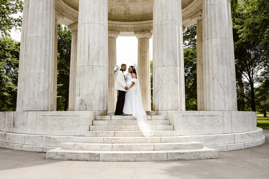 the wedding couple at the DC War Memorial