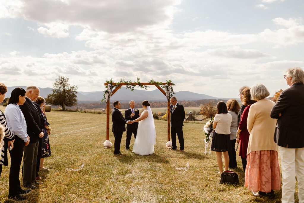 intimate vrbo wedding ceremony with mountain views in virginia
