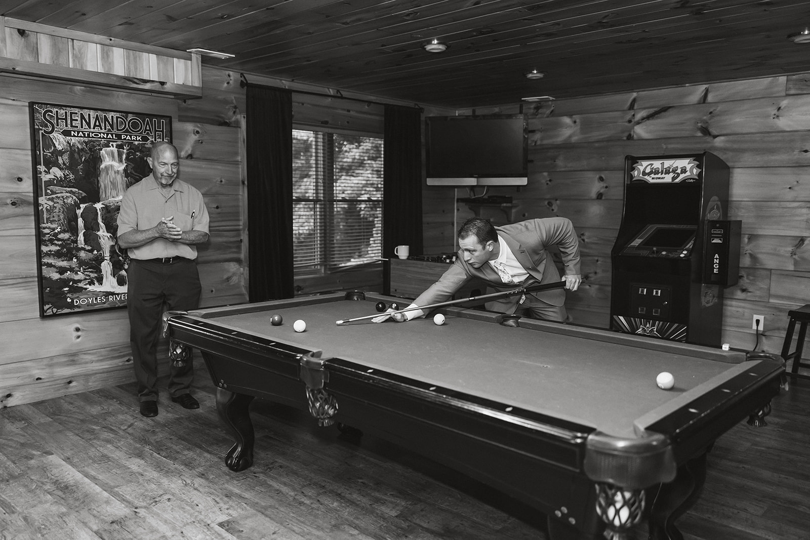 guests playing pool before the wedding day