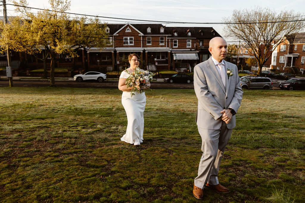 bride and groom cherry blossom wedding first look