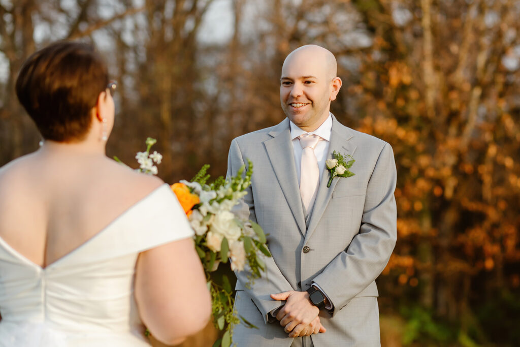 bride and groom cherry blossom wedding first look