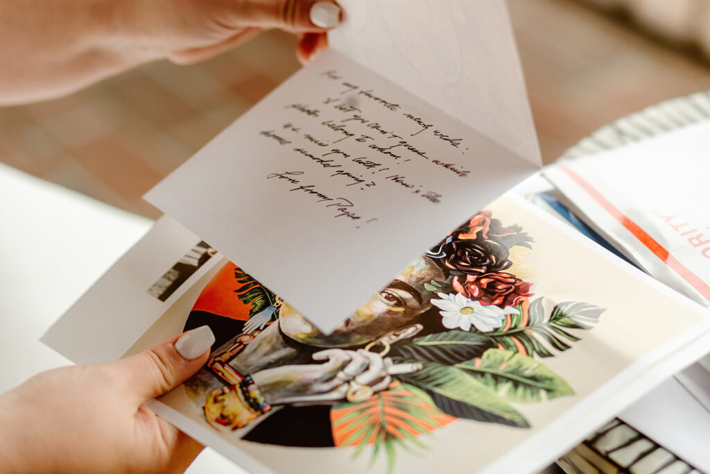 elopement couple reading letters together written by their loved ones
