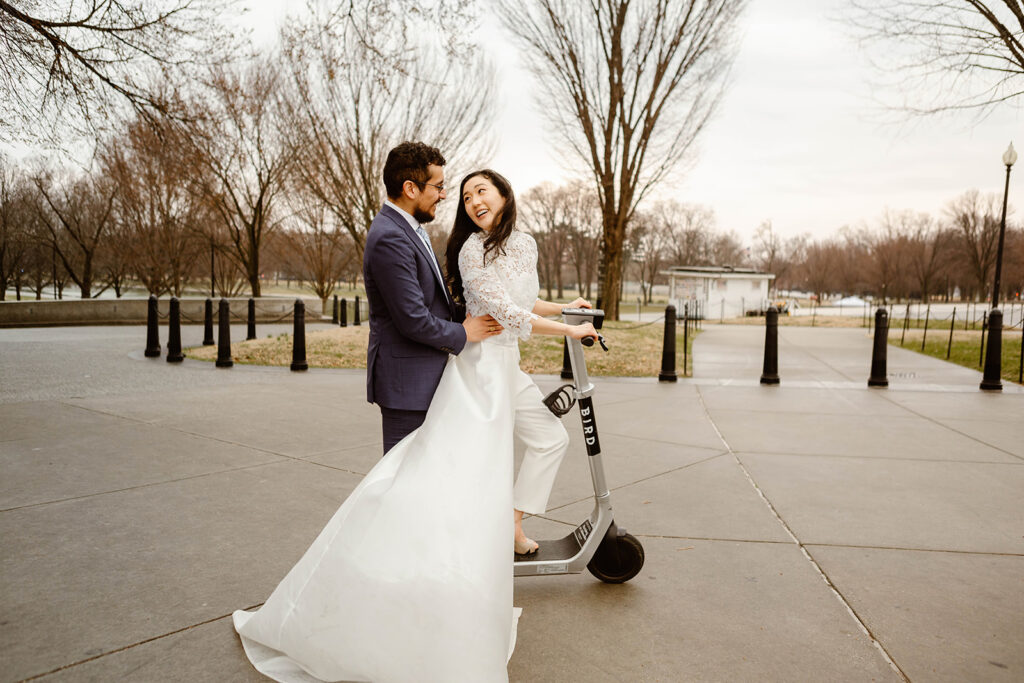 elopement couple zipping through the streets of washington dc