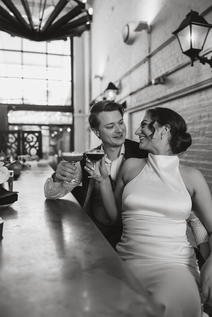 elopement couple celebrating their day with a toast
