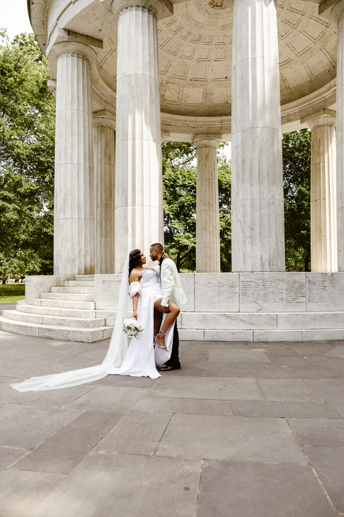 wedding couple posing during their dc war memorial, washington dc elopement on the front steps