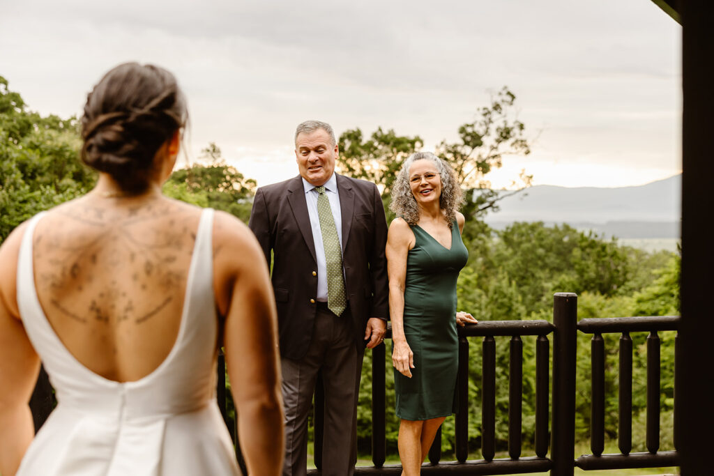 bride first look with her parents during her full day elopement in shenandoah national park
