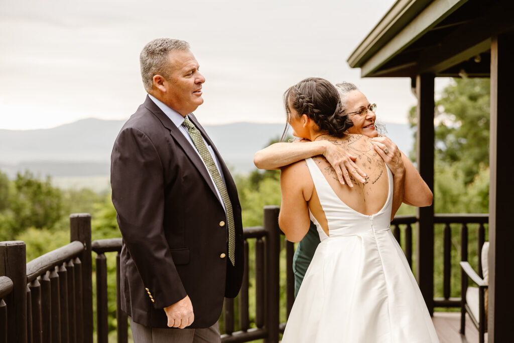 bride first look with her parents during her full day elopement in shenandoah national park