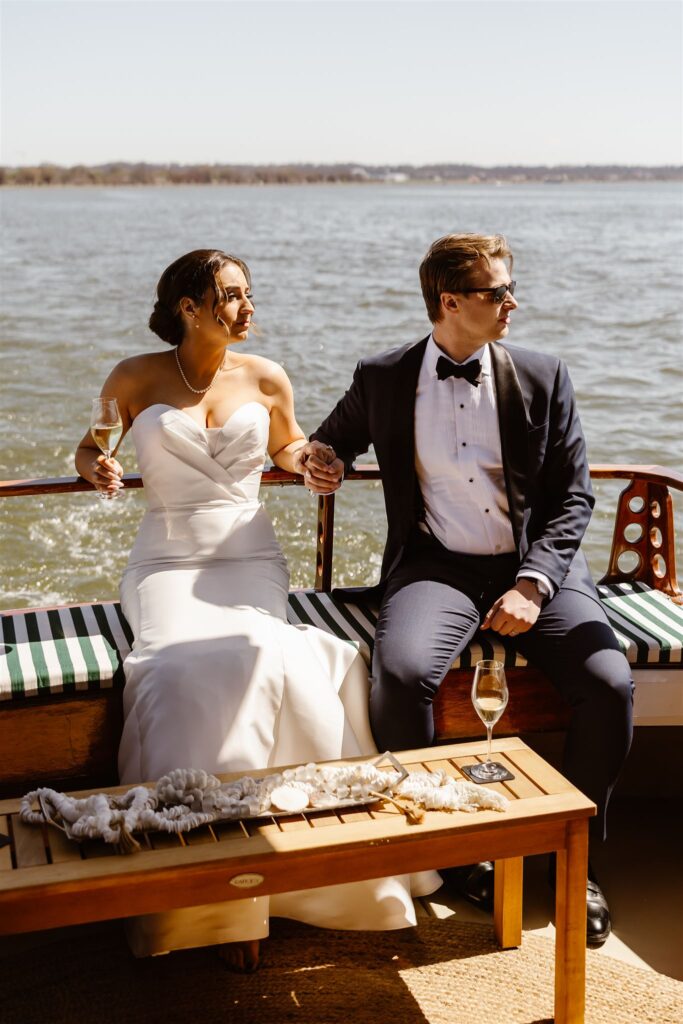 elegant elopement couple taking a boat ride during their full day elopement in washington dc