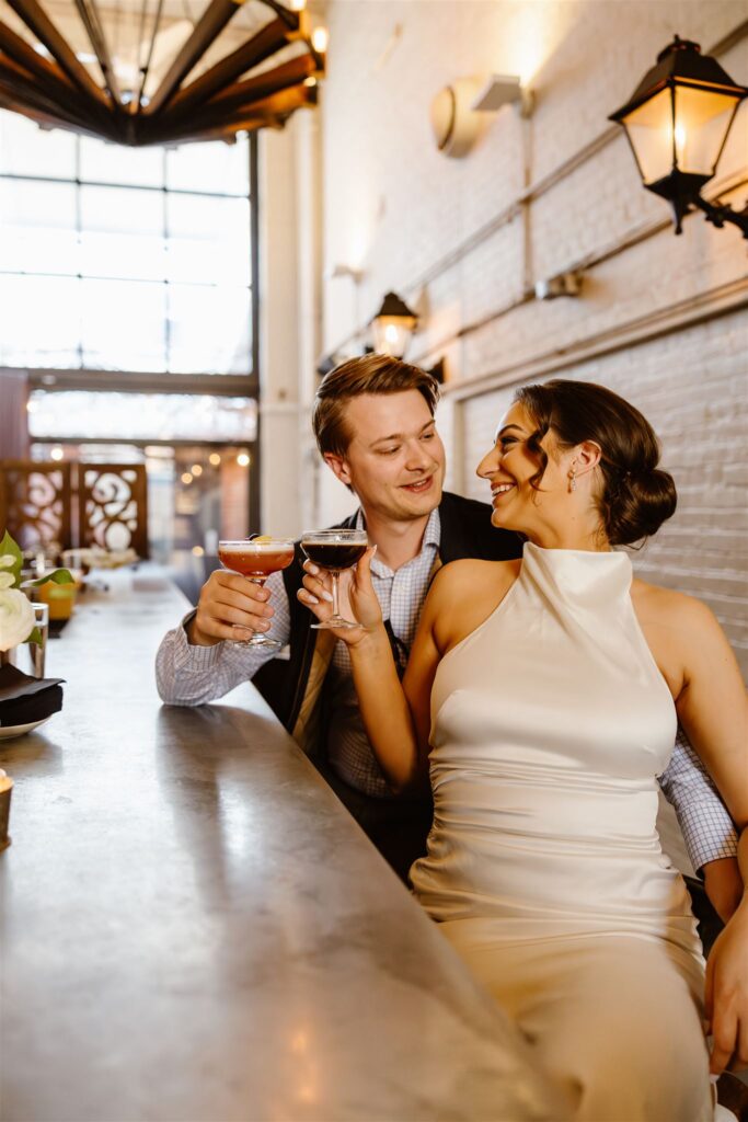 elegant elopement enjoying drinks at a bar full day elopement in washington dc