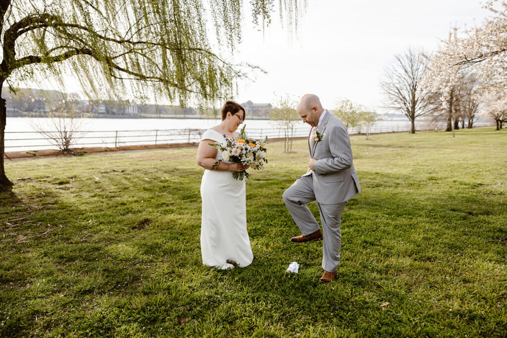 park elopement ceremony with cherry blossoms in the backdrop