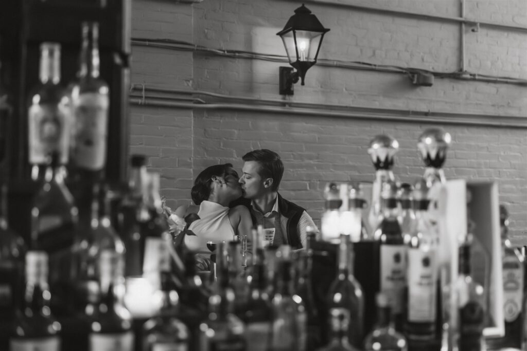 elopement couple enjoying cocktails at a bar